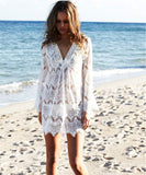 Long-sleeved white lace dress